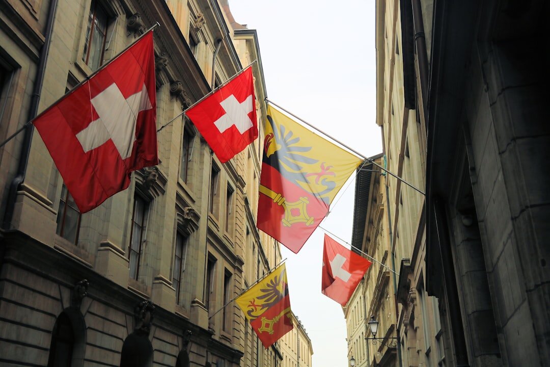 Swiss government building facade with flags